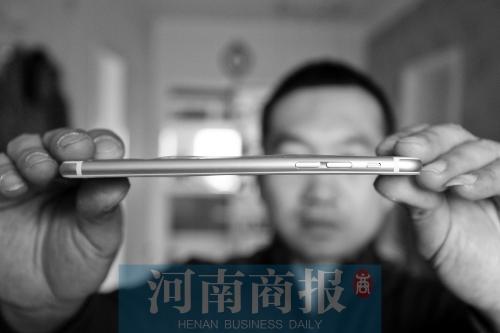 男子新买iPhone6是弯的 售后称无法直接换新机
